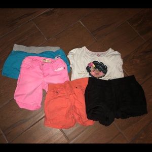 Lot of girls clothes, shorts, and tee shirt